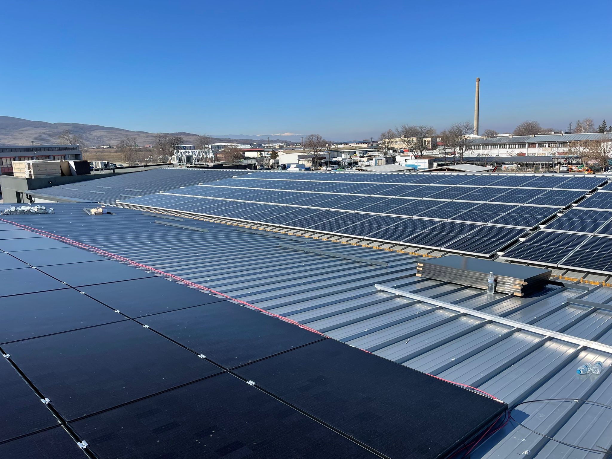 All-Black Shingled Panel Roof